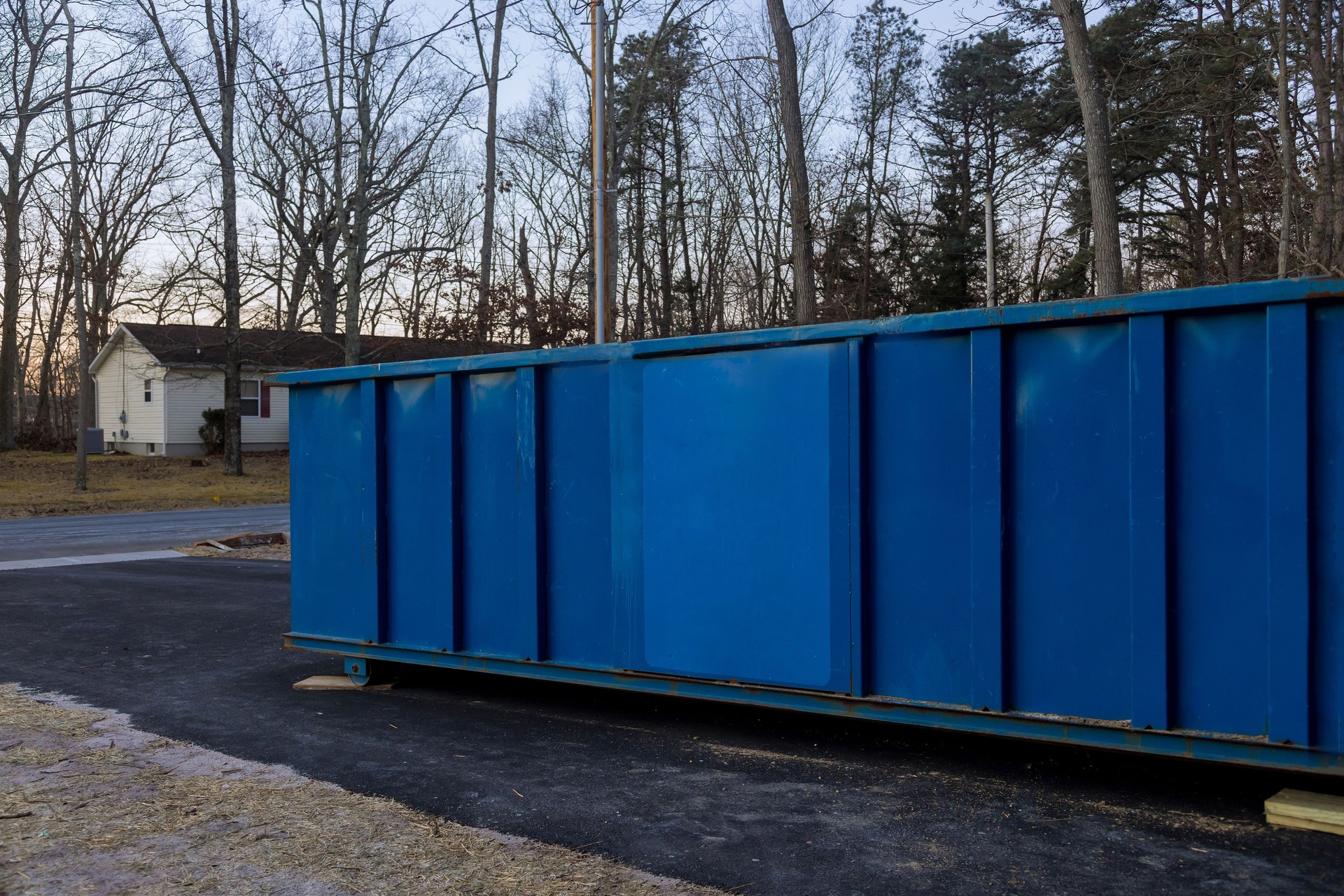 Construction trash dumpsters in an metal container, home house renovation.